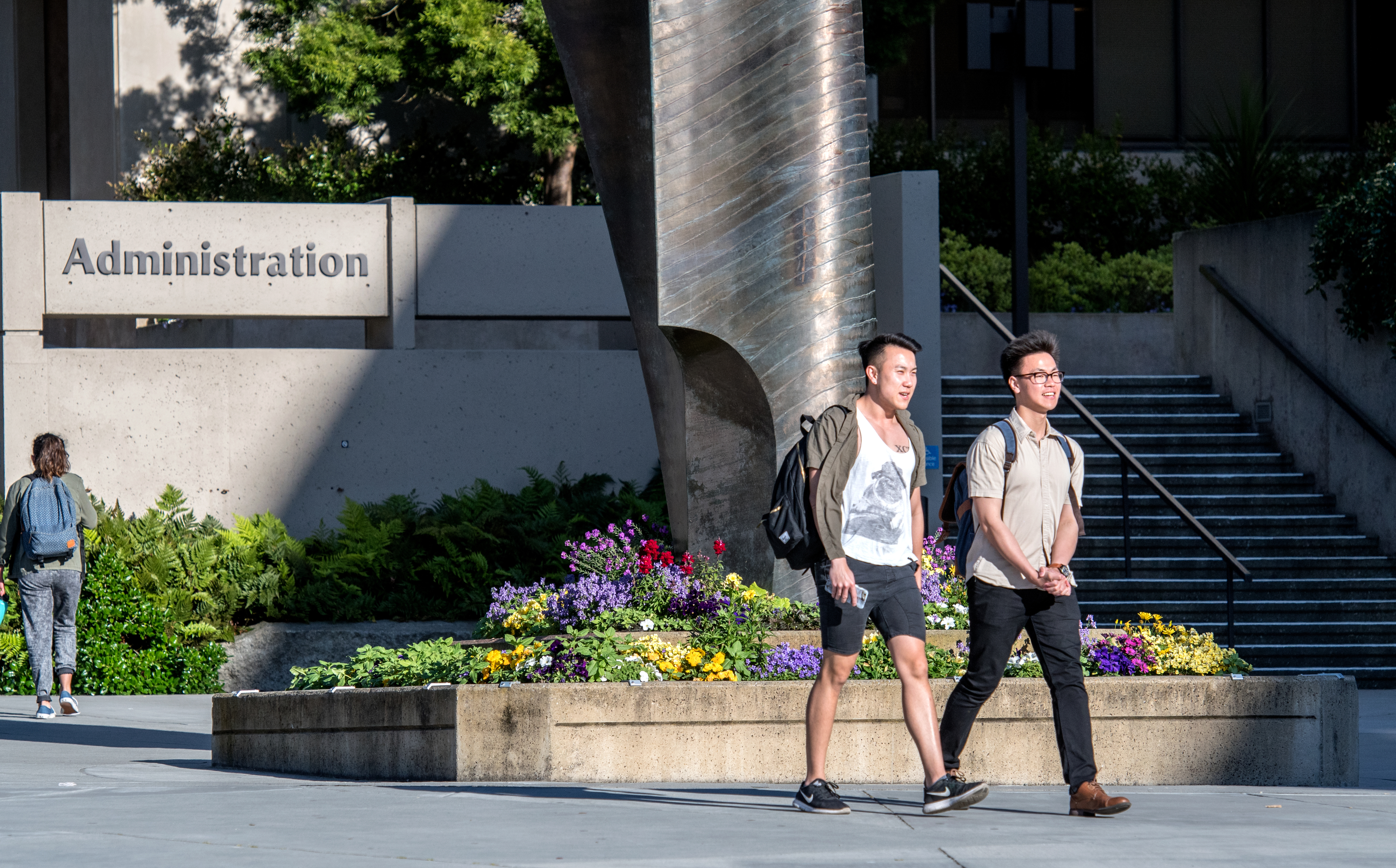 Students walking in front of the administration building